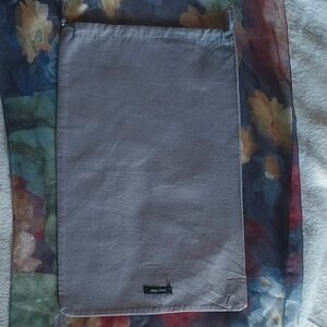 Miu Miu gray dust bag.